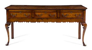 An English Oak Sideboard or Dresser Base Height 34 x width 71 1/2 x depth 19 3/4 inches.