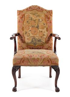 An English Armchair Height 44 1/2 x width 28 x depth 28 inches.