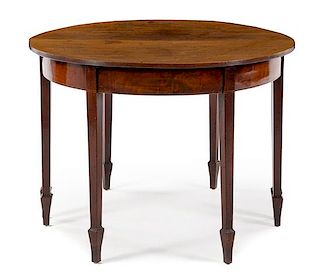 An English Convertible Center Table Height 30 x diameter 41 inches.