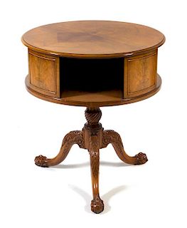 A Chippendale Style Walnut Drum Table Height 30 x diameter of top 28 inches.