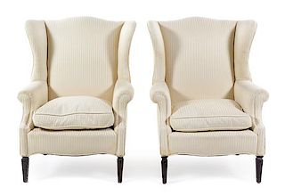 A Pair of Georgian Style Wingback Armchairs Height 39 inches.