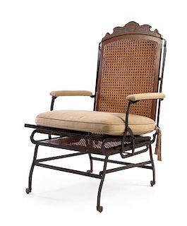 * A Victorian Iron and Walnut Reclining Chair Height 46 1/8 inches.