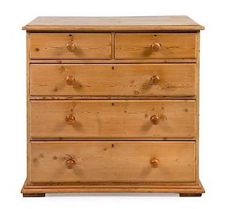 An English Pine Chest of Drawers Height 41 3/4 x width 43 1/4 x depth 21 1/4 inches.