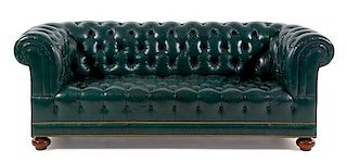 A Leather Upholstered Chesterfield Sofa Height 30 x width 78 inches.