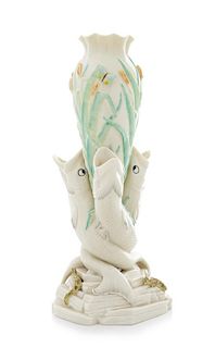 * A Belleek Triple Fish Vase Height 15 1 /2 inches.