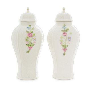 * A Pair of Belleek Millennium Covered Vases Height 12 inches.