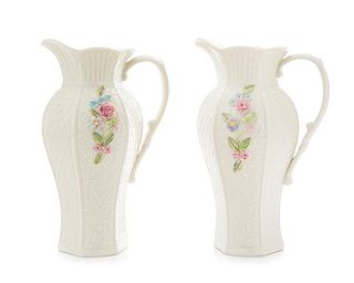 * Two Belleek Millennium Pitchers Height 10 1/4 inches.