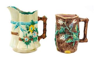 * Two Majolica Water Pitchers Height of taller 9 1/2 inches.
