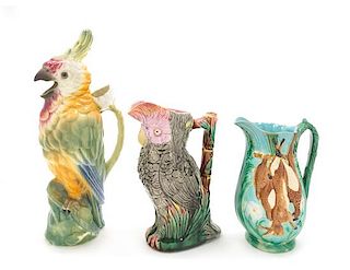* A Group of Three Majolica Vases Height of tallest 14 inches.