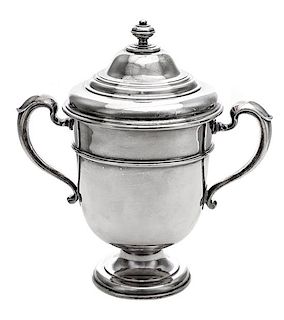 * An English Silver Twin-Handled Cup and Cover, Lionel Alfred Crichton, London, 1924, the domed lid with a knopped finial above