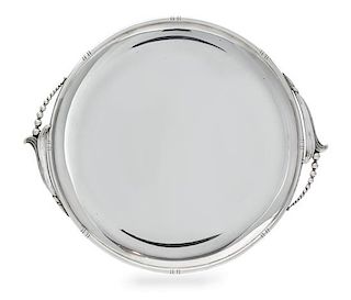 An American Silver Serving Tray, Woodside Sterling Co., New York, NY, Early 20th Century, of circular form with blossom form han
