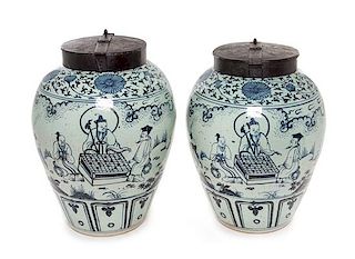 A Pair of Chinese Blue and White Porcelain Tea Jars Height 23 1/2 inches.