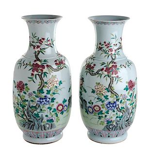 A Pair of Chinese Famille Rose Porcelain Vases Height 18 1/4 inches.