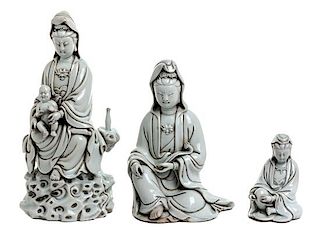 A Group of Three Chinese Blanc de Chine Figures Height of tallest 11 5/8 inches.