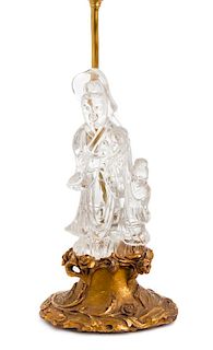 A Chinese Carved Rock Crystal Figural Group Height of figure 9 inches.
