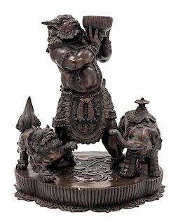 * A Japanese Bronze Figural Group Height 16 1/4 inches.
