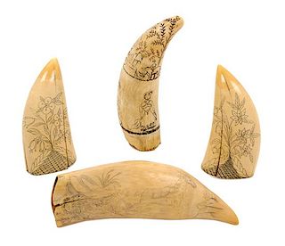 * Four Engraved Scrimshaw Whale Teeth Height of tallest 6 3/4 inches.