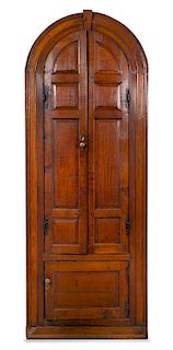 An American Oak Corner Cabinet Height 106 3/4 x width 36 1/2 inches.