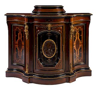 * A Victorian Parcel Gilt and Gilt Bronze Mounted Rosewood Cabinet Height 42 x width 60 x depth 20 1/2 inches.