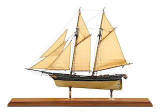 * A Model of the Schooner "Dolphin" Height 17 7/8 x length of base 26 inches.