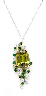 An 18 Karat White Gold, Sphene, Diamond and Emerald Pendant Necklace, Michael Youssoufian, 8.60 dwts.