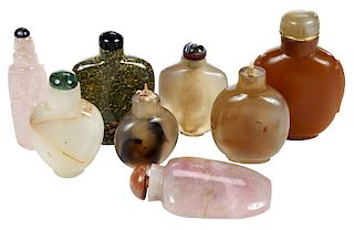 Eight Carved Asian Hardstone Snuff Bottles