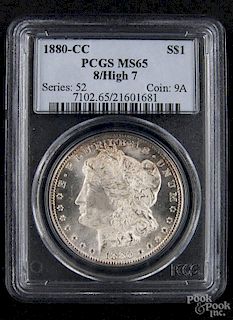 Silver Morgan dollar coin, 1880 CC, 8/high 7, PCGS MS-65.