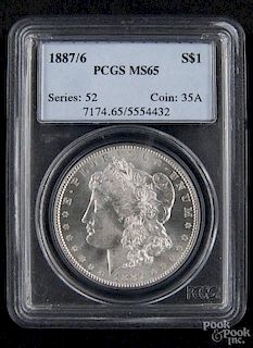 Silver Morgan dollar coin, 1887/ 6, PCGS MS-65.