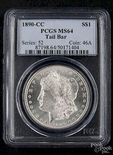 Silver Morgan dollar coin, 1890 CC, tail bar, PCGS MS-64.