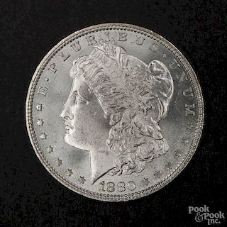 Silver Morgan dollar coin, 1880, MS-62 to MS-63.