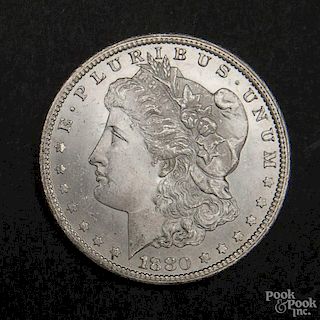 Silver Morgan dollar coin, 1880 CC, MS-63 to MS-64.