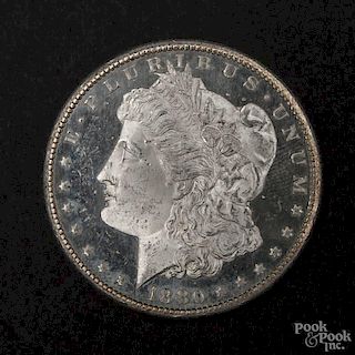 Silver Morgan dollar coin, 1880 S DMPL, MS-63 to MS-64.