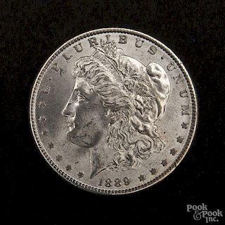 Silver Morgan dollar coin, 1889, MS-63 to MS-64.