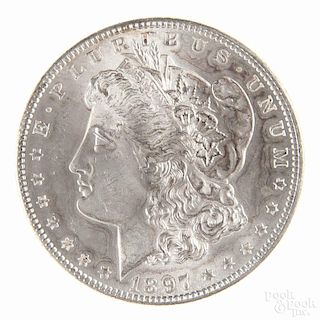 Silver Morgan dollar coin, 1897, MS-60 to MS-63.