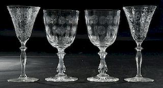 Nine Engraved and Cut Glass Stems