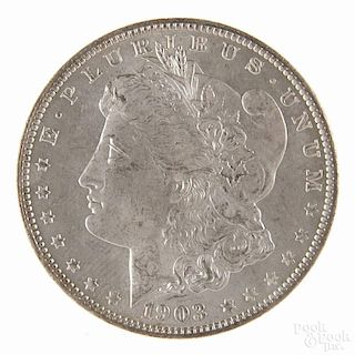 Silver Morgan dollar coin, 1903 O, MS-64 to MS-65.