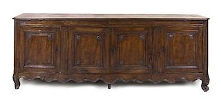 A Louis XV Provincial Walnut Side Cabinet, Height 41 x width 109 1/2 x depth 25 inches.