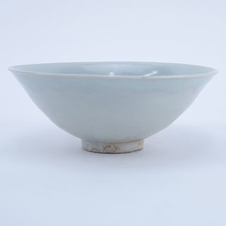 Chinese Song Dynasty (1127–1279) Oingbai Ware Bowl. a bowl with freely combed wavy lines in the interior covered with pale bluish-green glaze. Unsigne
