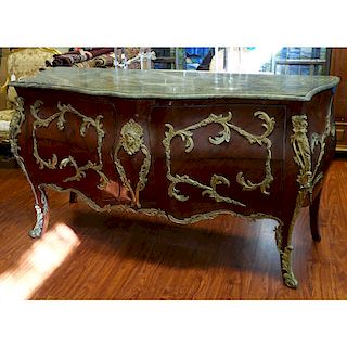 Large Louis XV Style Gilt Bronze Mounted Marble Top Commode. Includes four drawers with foliage for