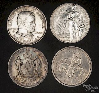 Four commemorative half dollar coins, to include a 1922 Grant, a 1925 Stone Mountain, a 1920 Maine,