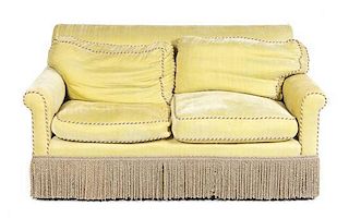 An Upholstered Two-Seat Sofa, Height 30 1/2 x width 55 1/4 x depth 32 inches.