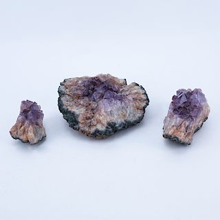 Three (3) Amethyst Geodes. Largest measures 4" H x 9" W. Shipping $75.00 (estimate $50-$100)