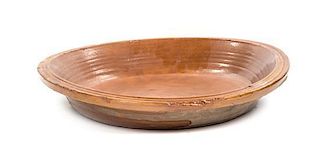A Mexican Pottery Bowl, Diameter 22 inches.