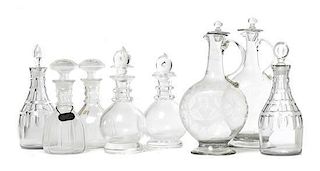 Eight Glass Decanters, Height of tallest 14 3/4 inches.