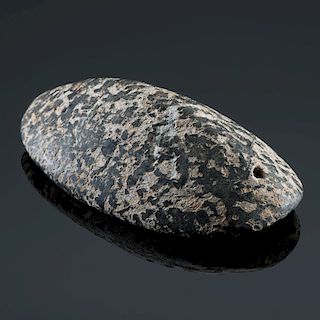 A Rare Humped Granite Gorget