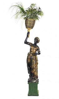 A Venetian Painted and Parcel Gilt Blackamoor Figure, Height of figure 71 inches.
