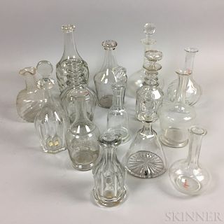 Fourteen Blown Colorless Glass Decanters