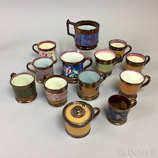 Thirteen Copper and Pink Lustre Mugs.  Estimate $200-300