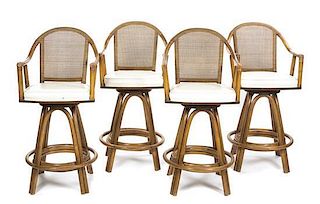 A Set of Four Faux Bamboo and Wicker Bar Seats, Height 44 3/8 inches.