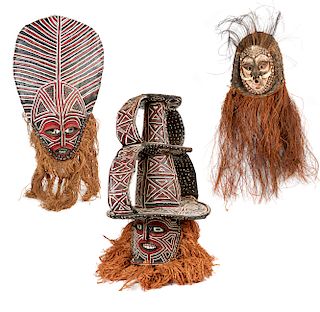 Two Chokwe Kihongo Masks and One Papua New Guinea, Sepik River Latmul Helmet Mask